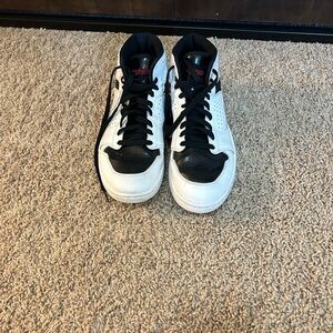 Nike Jumpman Black and White Mid-Top Sneakers